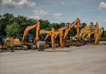 Construction equipment for sale, including backhoes, skid steers, excavators, compaction, pavers, and more.